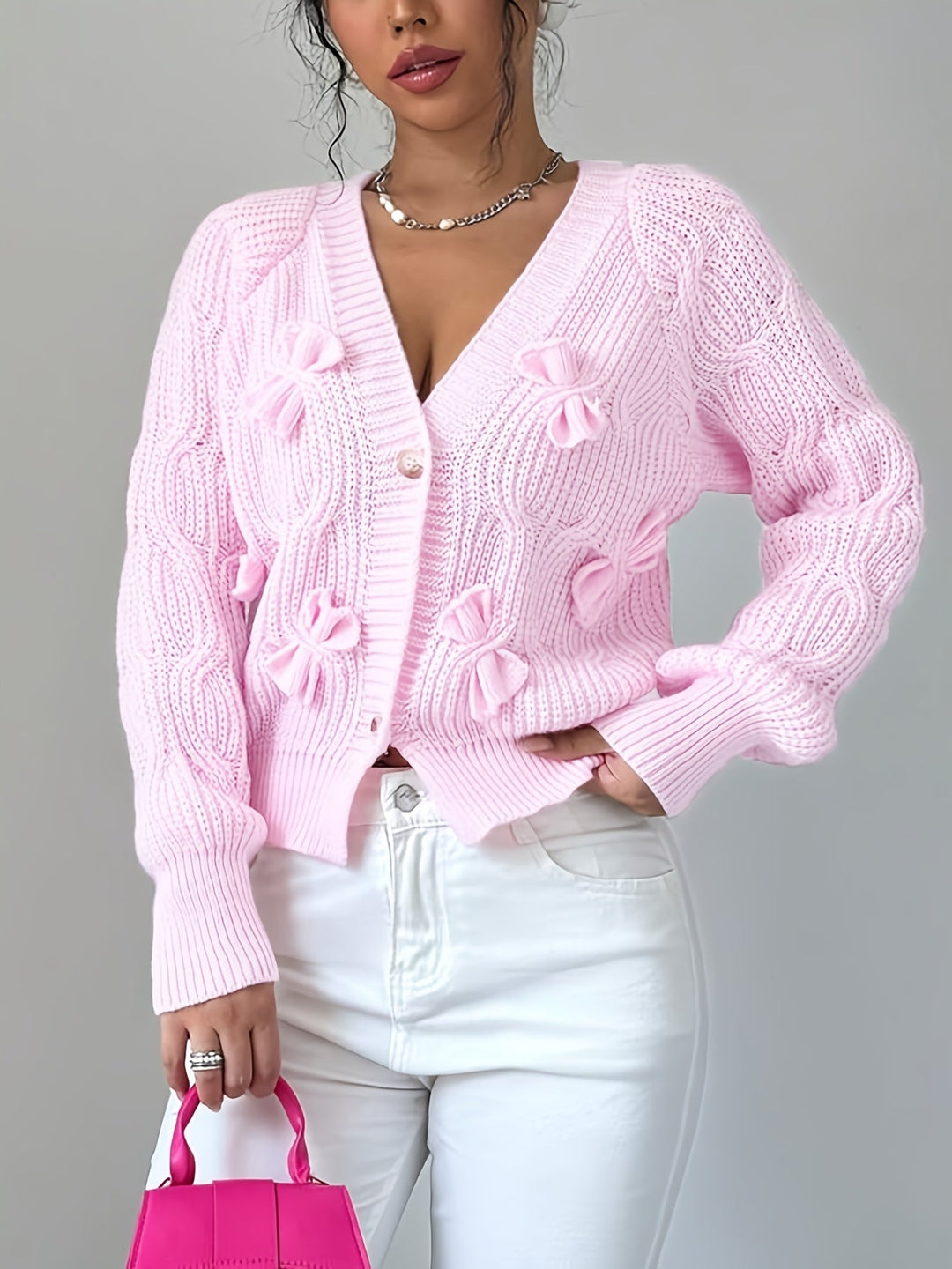 Perpetua – Bow-Detail Cable-Knit Cardigan